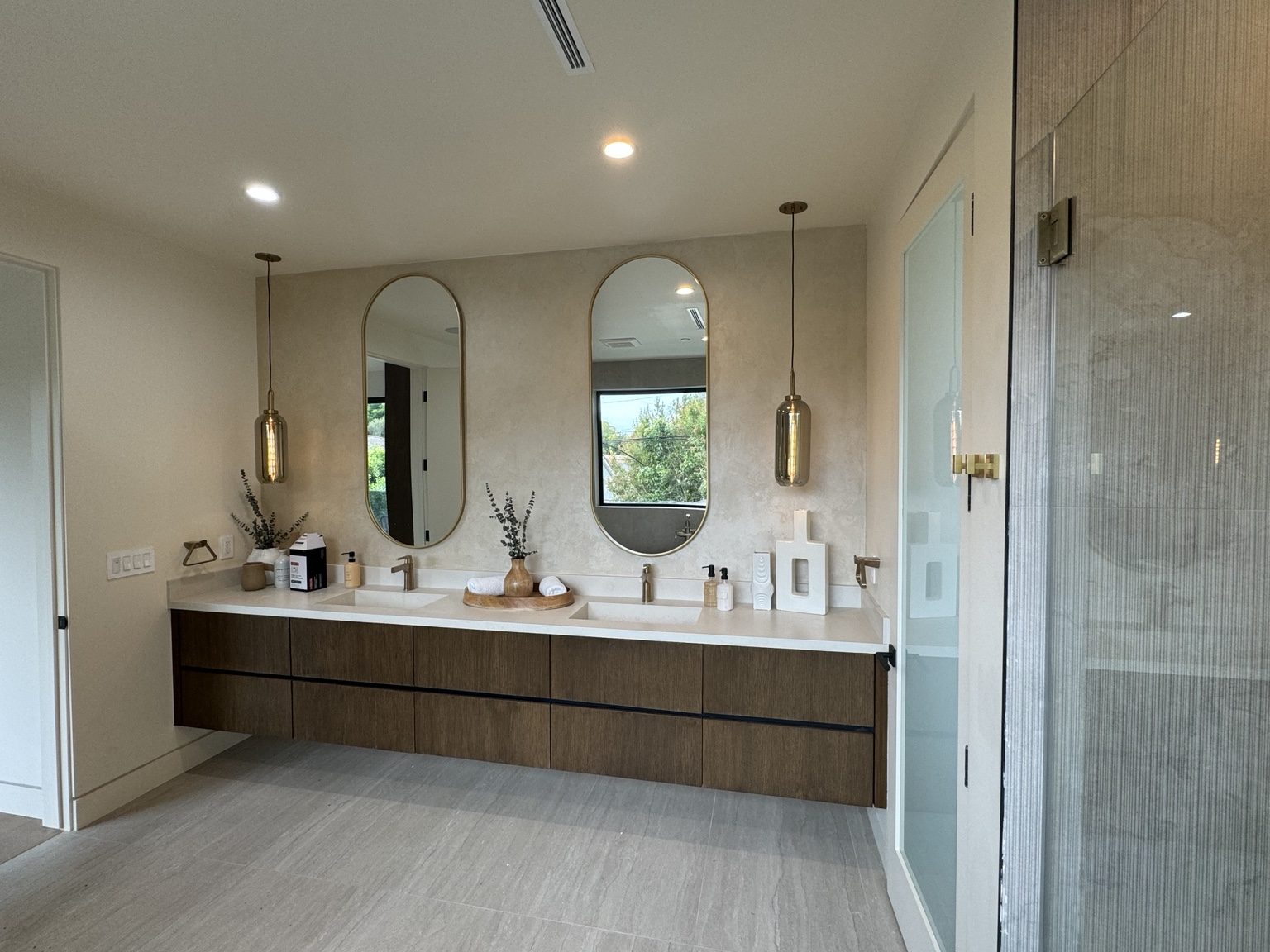Double vanity primary bathroom renovation by Coastline DC