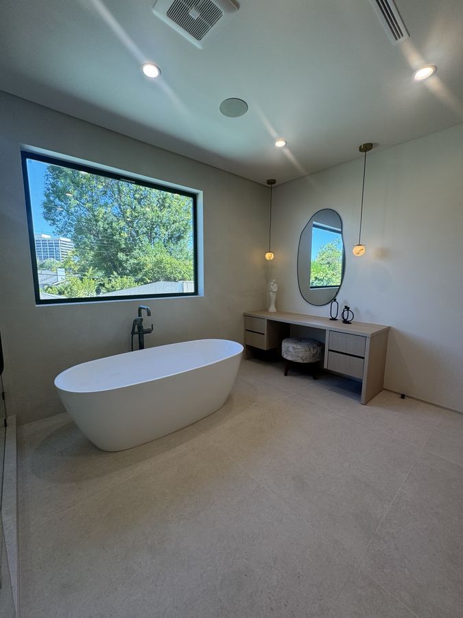 Freestanding soaking tub bathroom renovation by Coastline DC