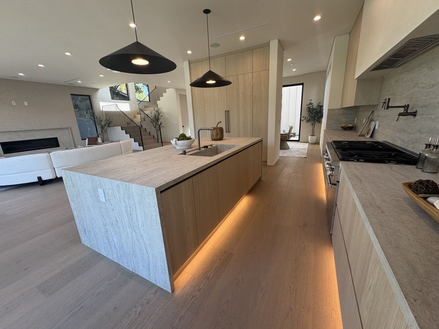 Custom kitchen island and pendant lighting by Coastline DC