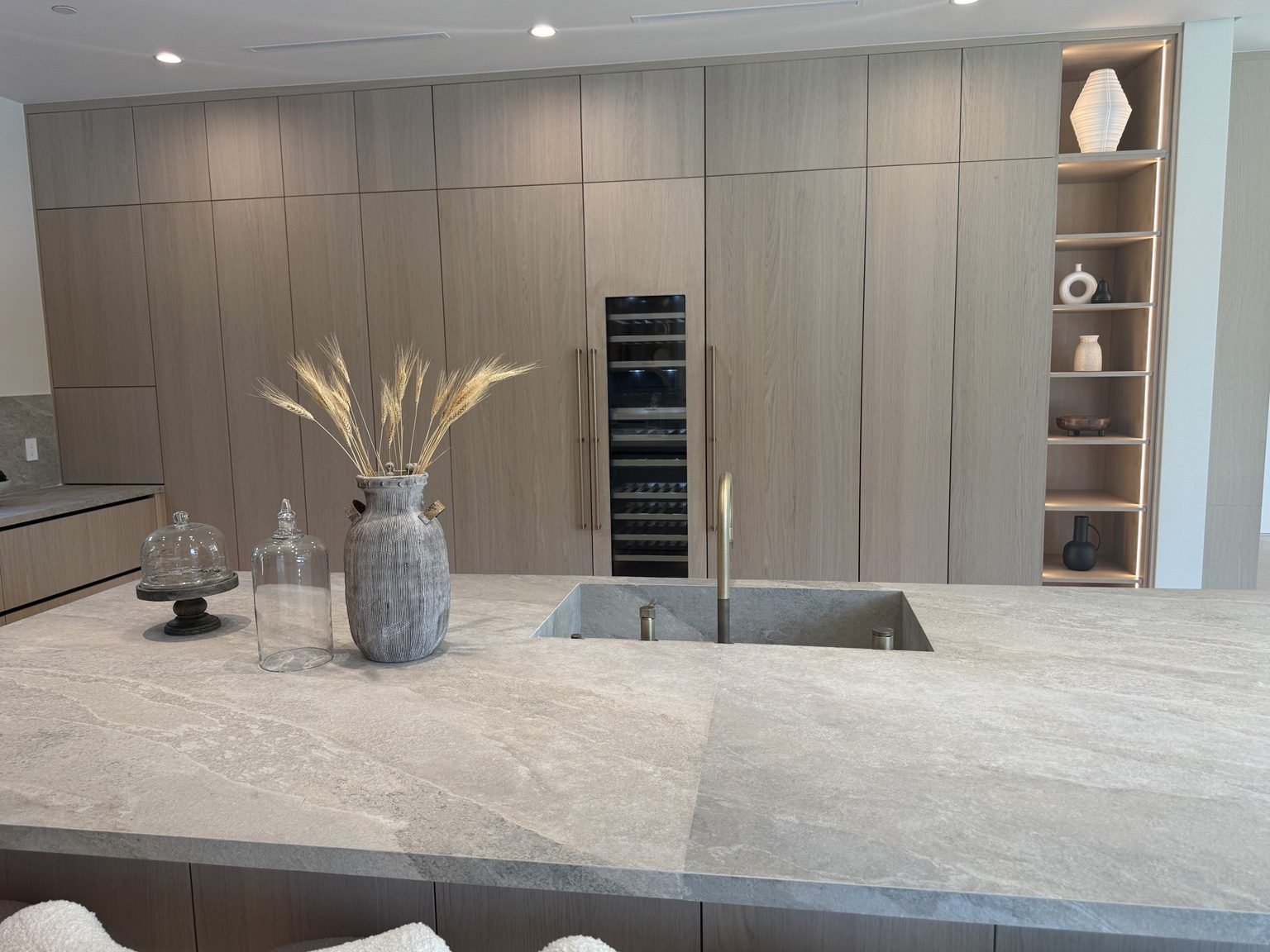 Stone waterfall kitchen island by Coastline DC