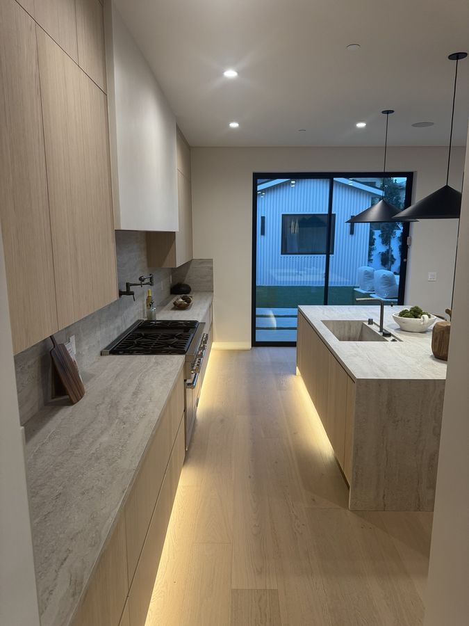 Custom kitchen cabinetry and workspace by Coastline DC