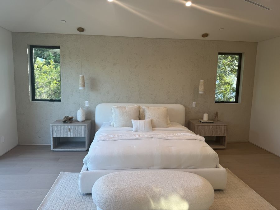 Finished primary bedroom in a Coastline DC custom home