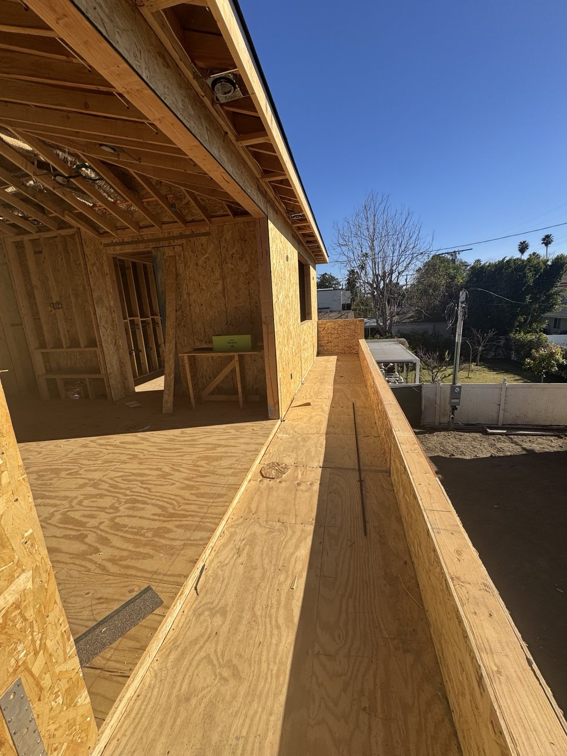 Exterior framing and scaffolding on a Coastline DC build