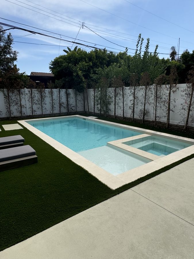Finished pool with landscaping by Coastline DC
