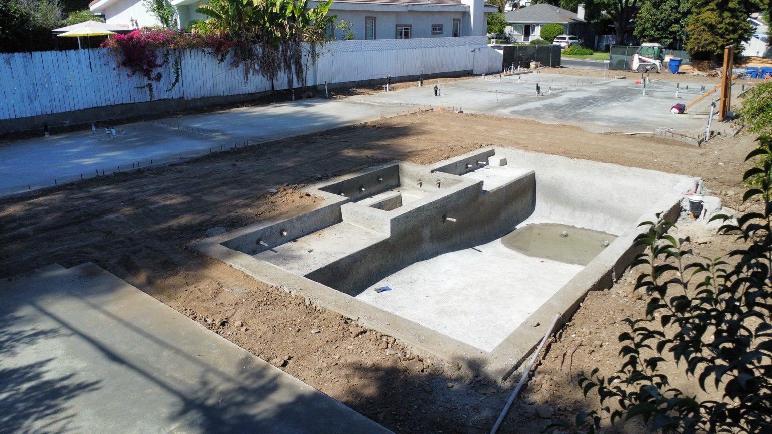 Aerial view of swimming pool construction by Coastline DC